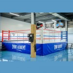 Боксерский ринг Fighttech на помосте Е10590 7 х 7 м, помост 1 м, внутри канатов 6,1 х 6,1.
